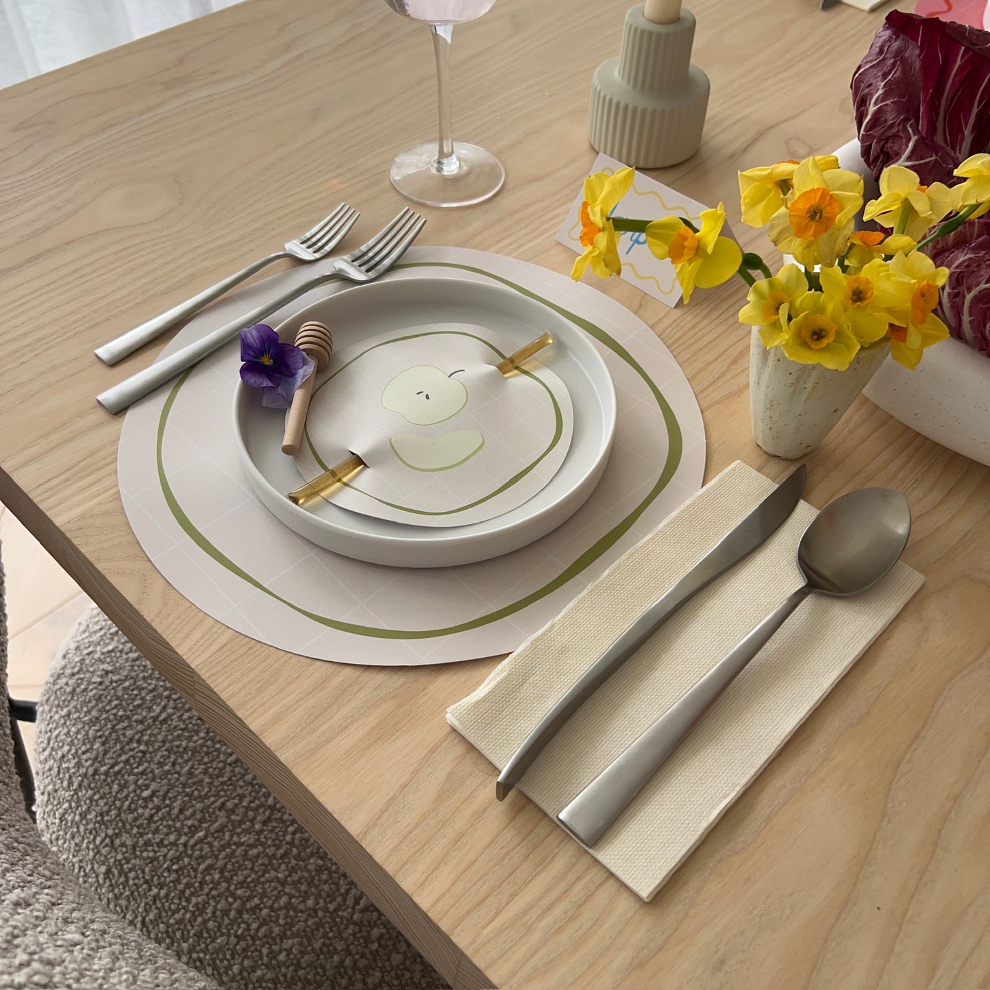 Rosh Hashana themed place setting with apple artwork, honey topper, matching name card and napkin.